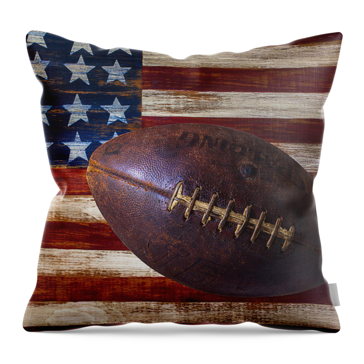 Football Throw Pillow featuring the photograph Old Football On American Flag by Garry Gay