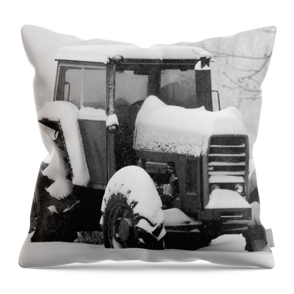Snow Throw Pillow featuring the photograph Old Tractor in the Snow by Holden The Moment