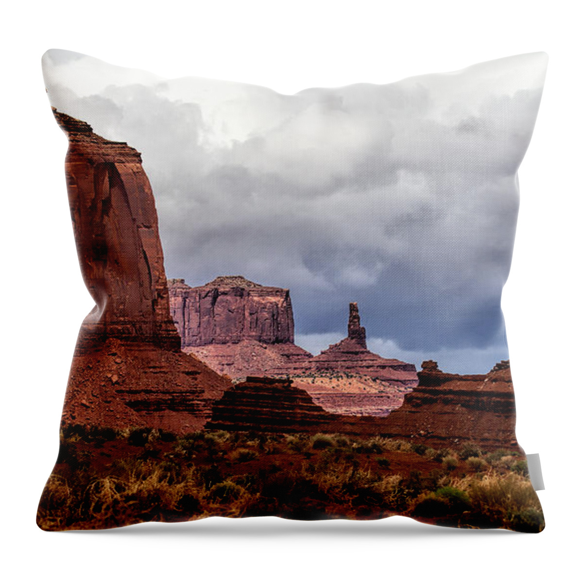 Monument Valley Throw Pillow featuring the photograph Rain Over the Monuments by Jim Garrison