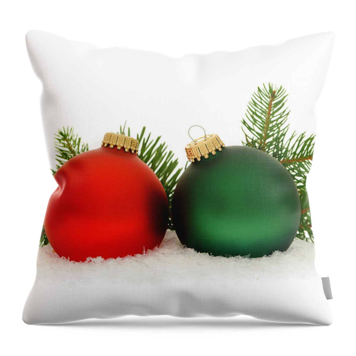 Christmas Throw Pillow featuring the photograph Red and green Christmas baubles by Elena Elisseeva