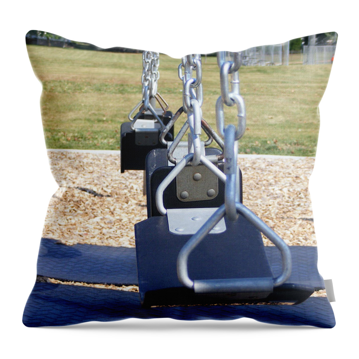 Black Throw Pillow featuring the photograph Swings by Michelle Hoffmann