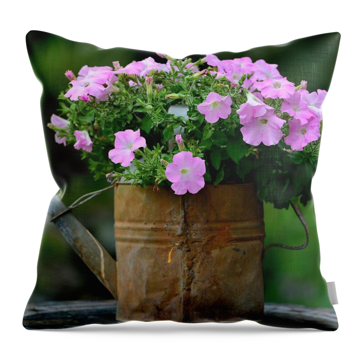 Watering Can Throw Pillow featuring the photograph Watering can and flowers by Kathy King