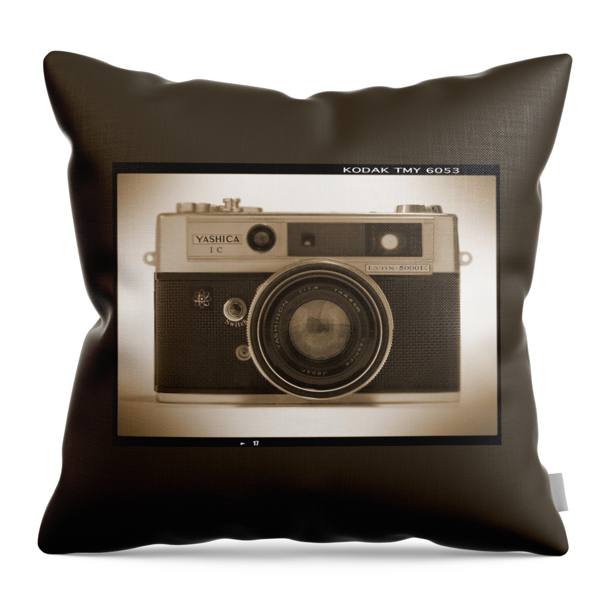 Classic Film Camera Throw Pillow featuring the photograph Yashica Lynx 5000E 35mm Camera by Mike McGlothlen