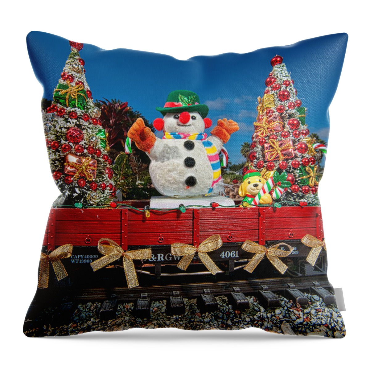 Snowman Throw Pillow featuring the photograph Christmas Snowman On Rails by Christopher Holmes