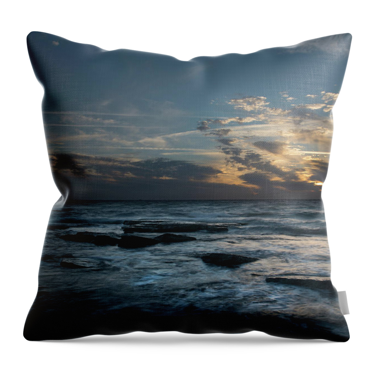 Sunset Over Sea Throw Pillow featuring the photograph Sunset on a rocky beach by Michalakis Ppalis
