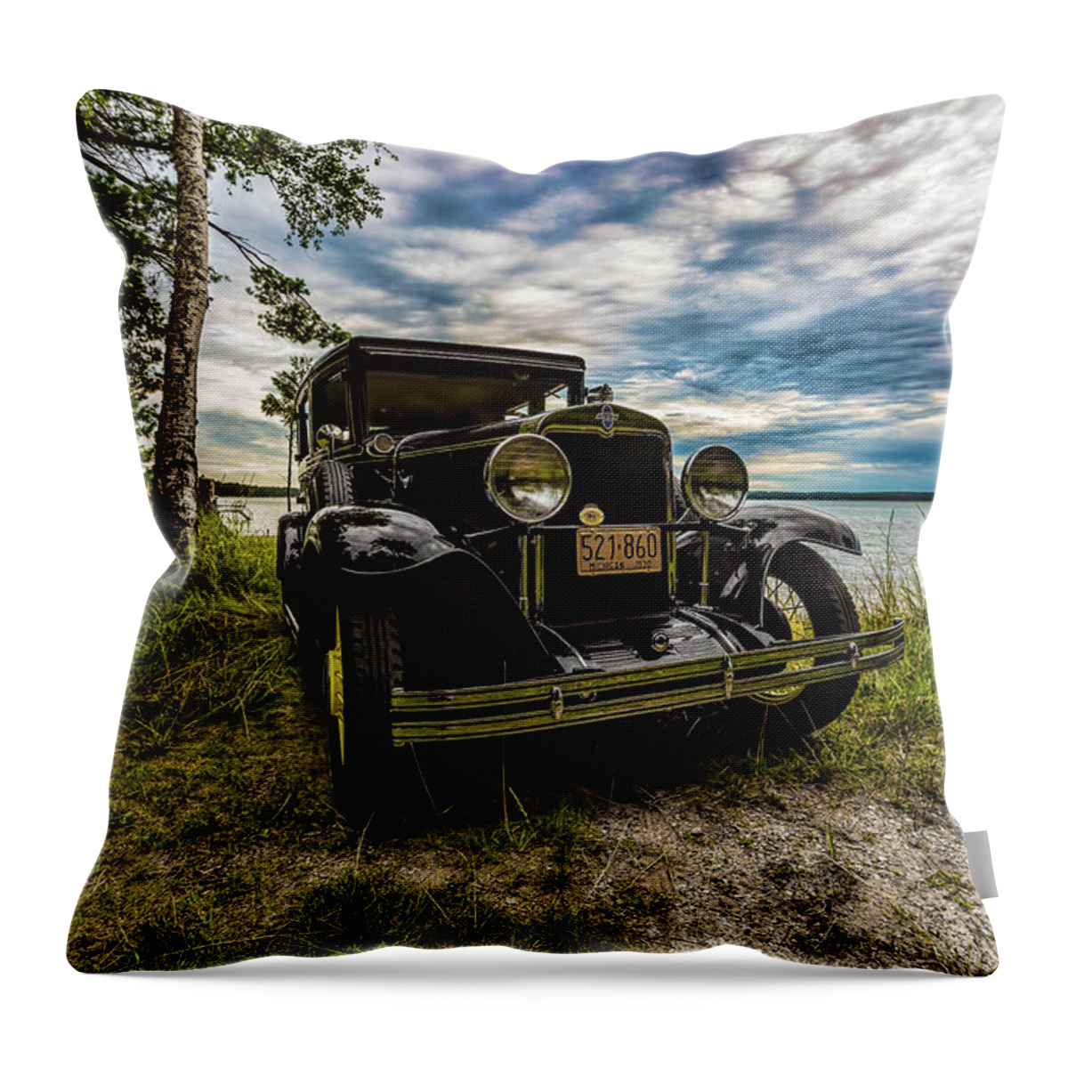 Higgins Lake Throw Pillow featuring the photograph 1930 Chevy on the shore of Higgins Lake by Joe Holley