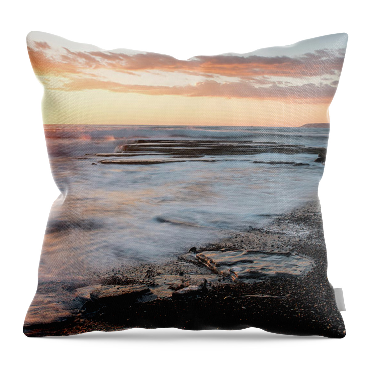 Seascape Throw Pillow featuring the photograph Beautiful dramatic Sunset over a rocky coast by Michalakis Ppalis