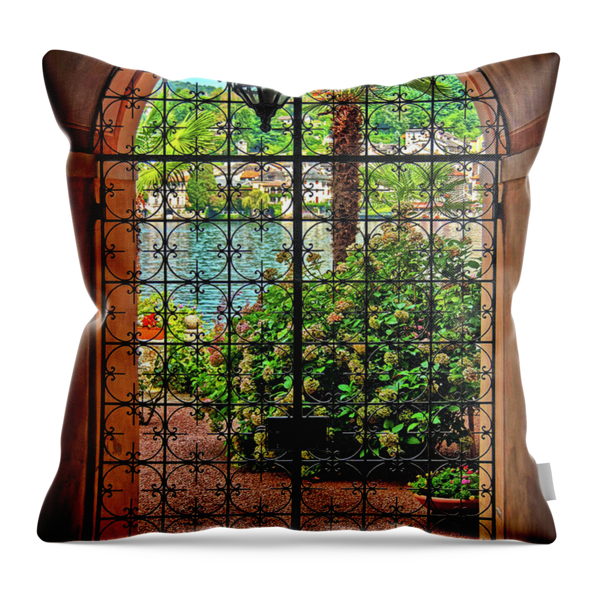 Wrought-iron Throw Pillow featuring the photograph Behind the Wrought-Iron Door by Hanny Heim