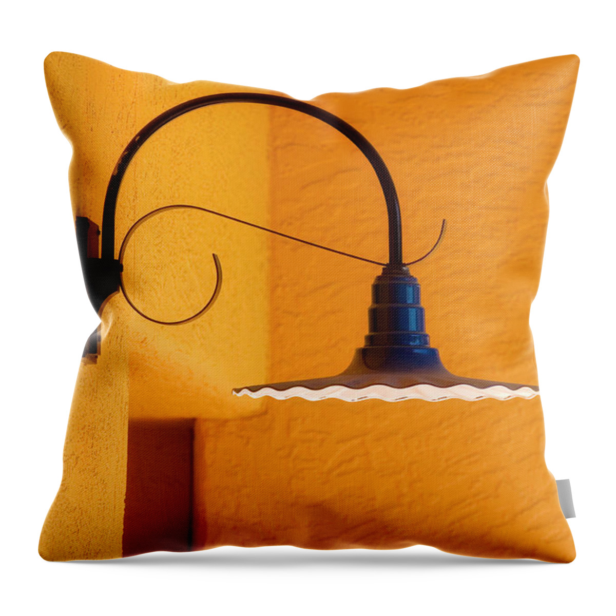 La Placita Throw Pillow featuring the photograph Curved Outdoor Light Bright Yellow Wall by Carol Leigh