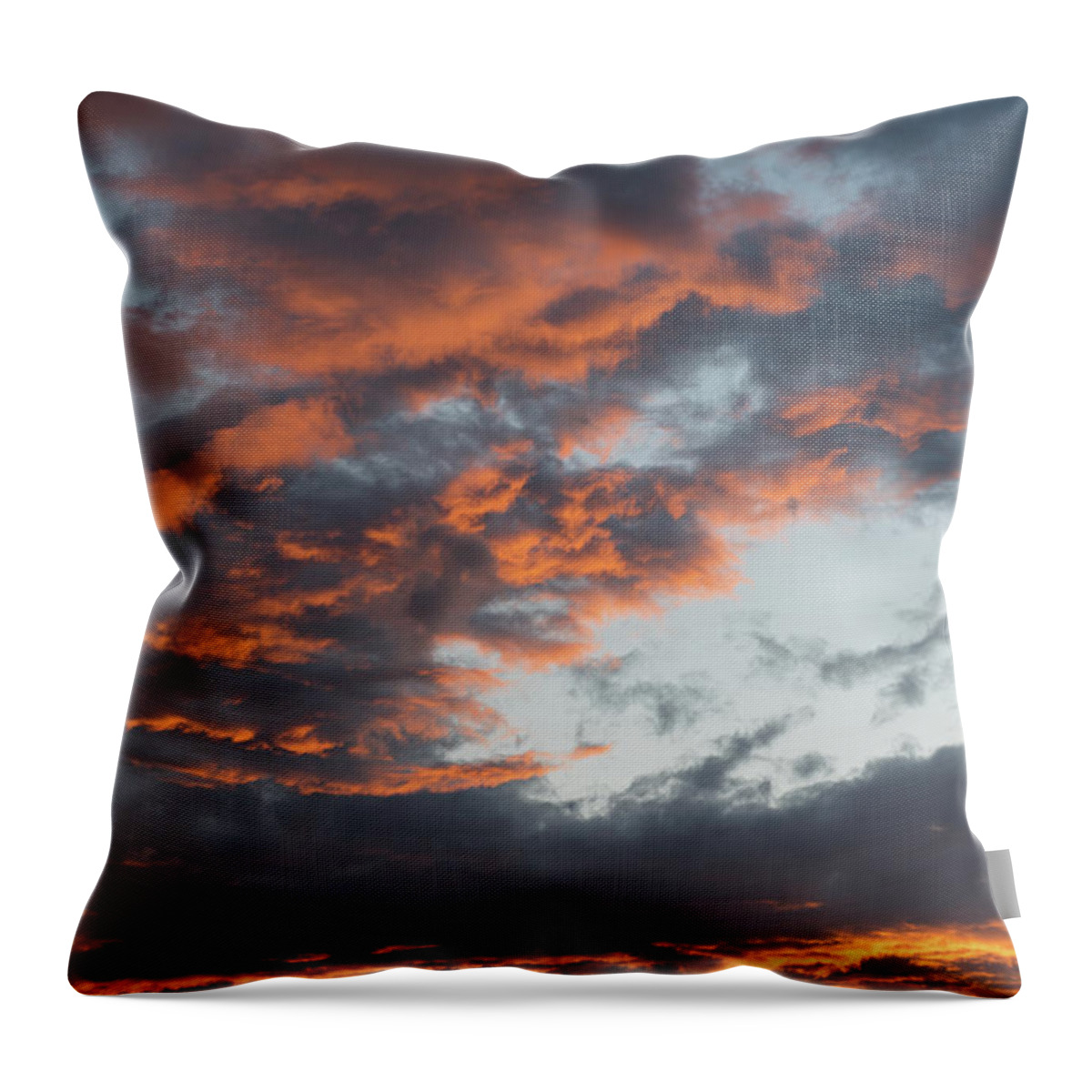 Stormy Clouds Throw Pillow featuring the photograph Dramatic sunset sky with orange cloud colors by Michalakis Ppalis