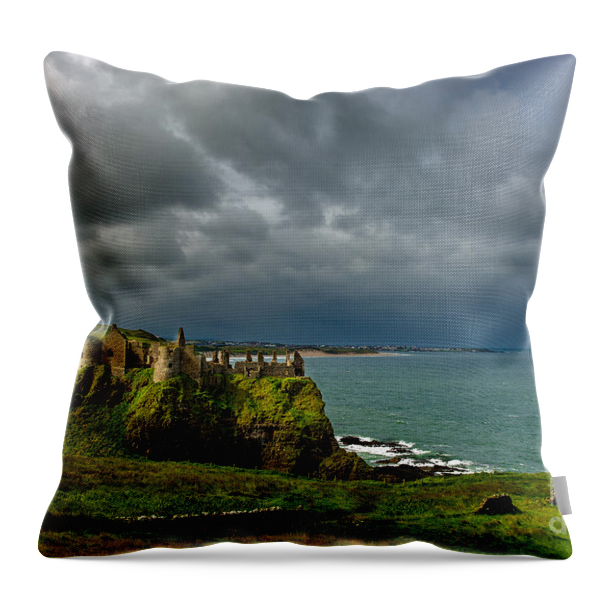 Castle Throw Pillow featuring the photograph Dunluce Castle in Northern Ireland by Andreas Berthold