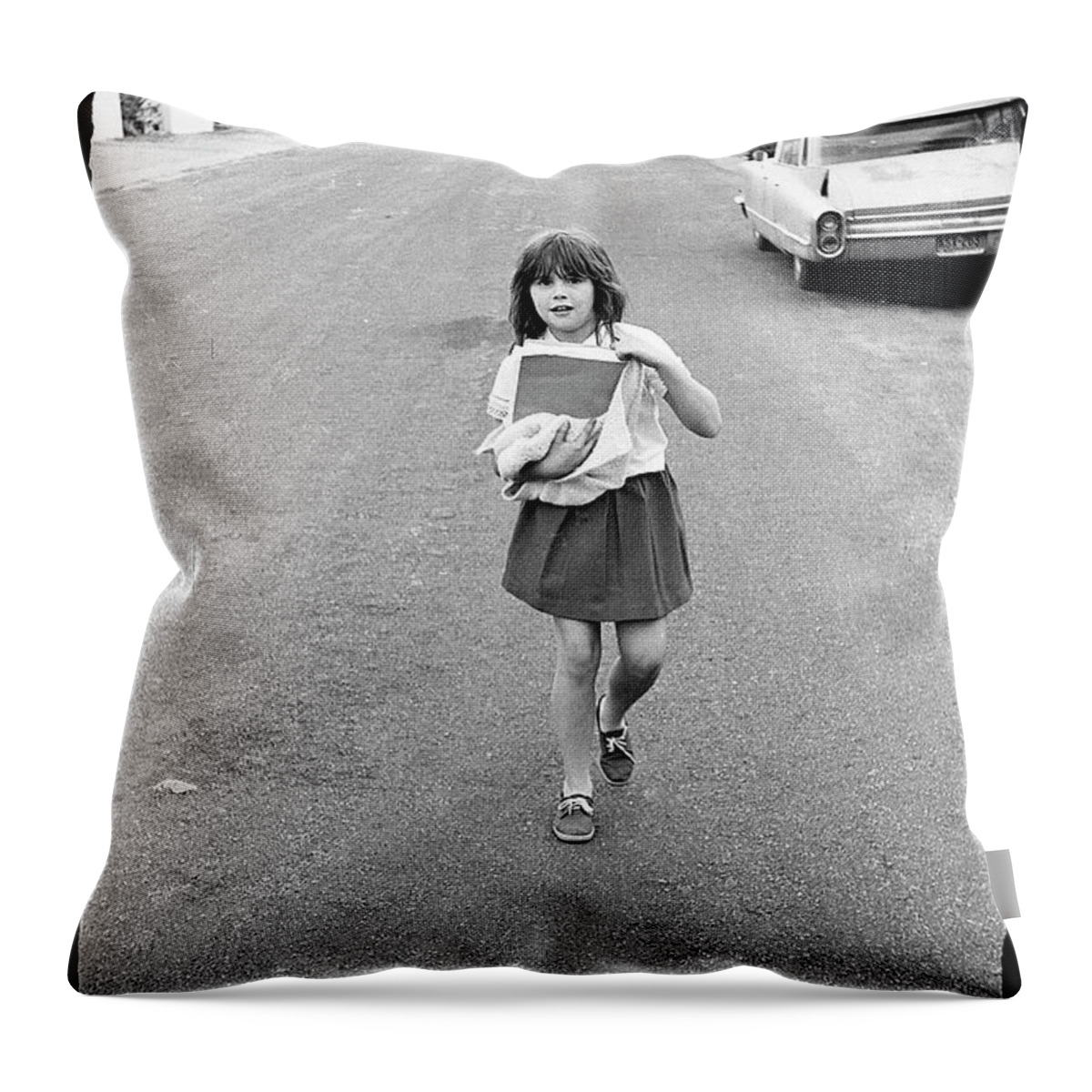 Phoenix Throw Pillow featuring the photograph Girl on 13th Street, 1971 by Jeremy Butler