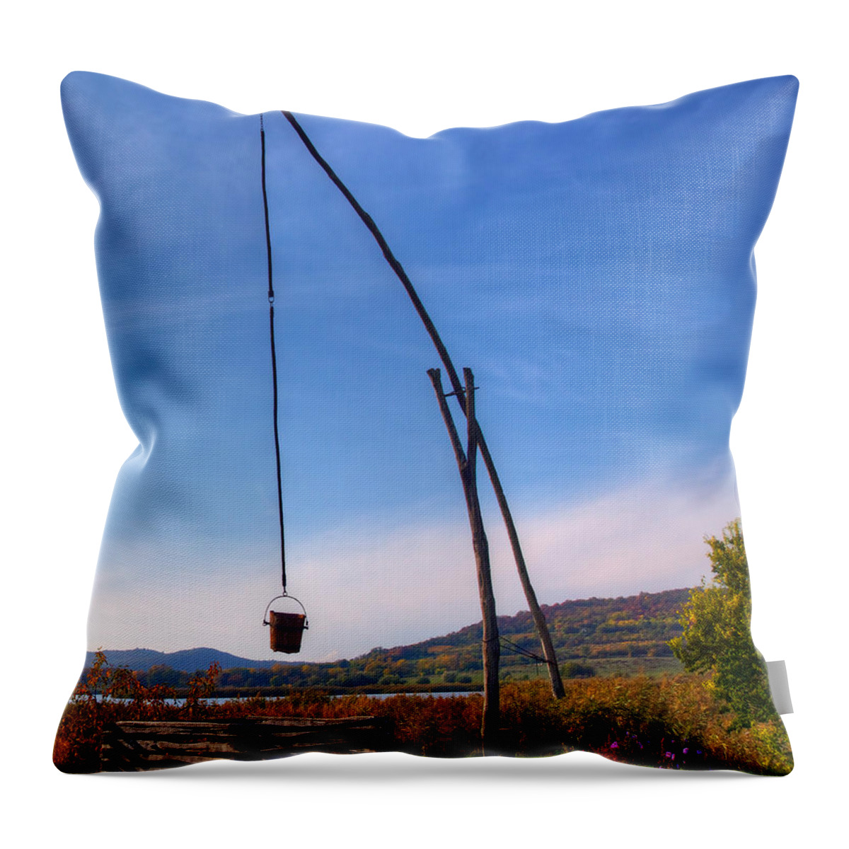 Well Throw Pillow featuring the photograph Hungarian Well by Peter Kennett