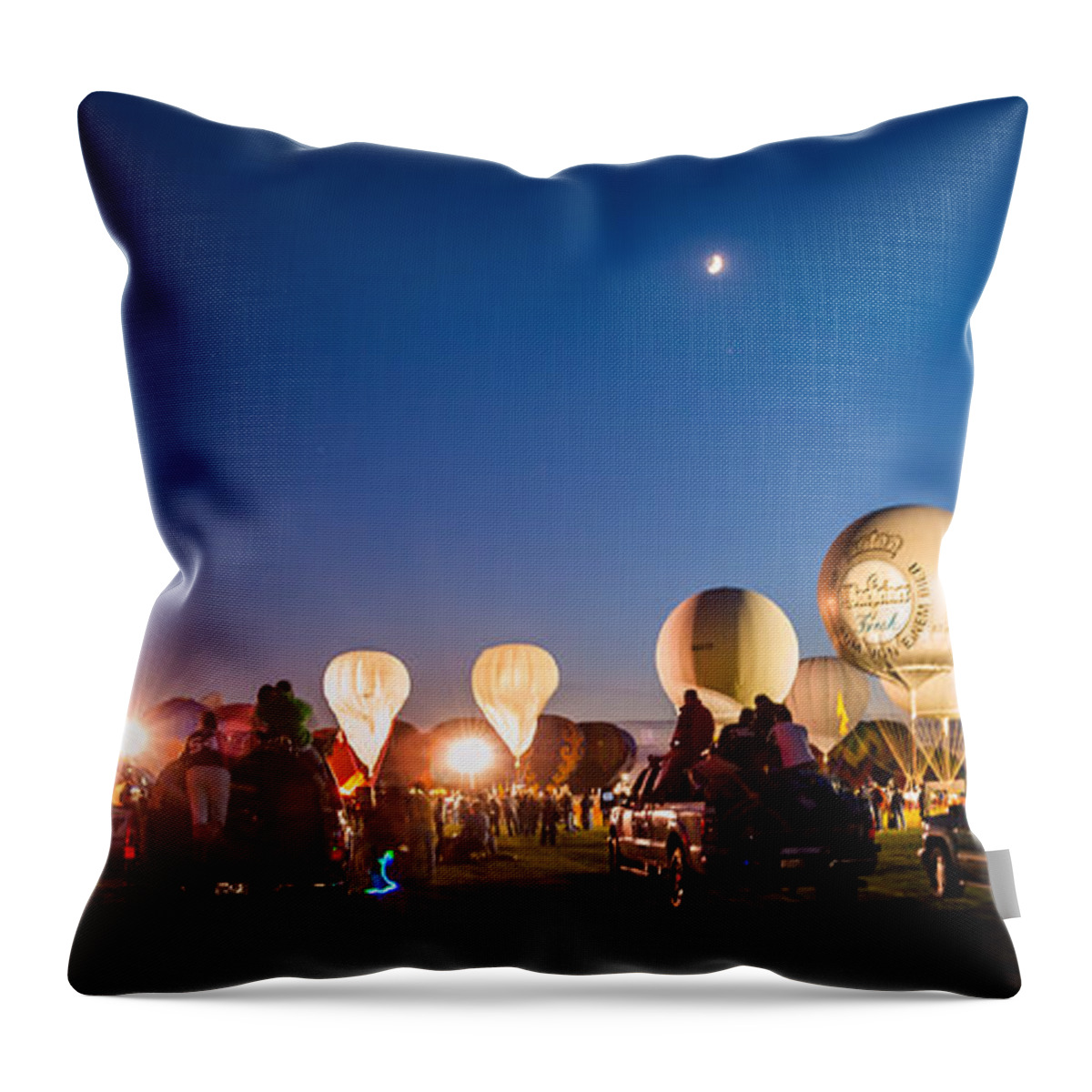 Multiple Hot Air Balloons Throw Pillow featuring the photograph Multiple Hot air Balloons night glow by Charles McCleanon