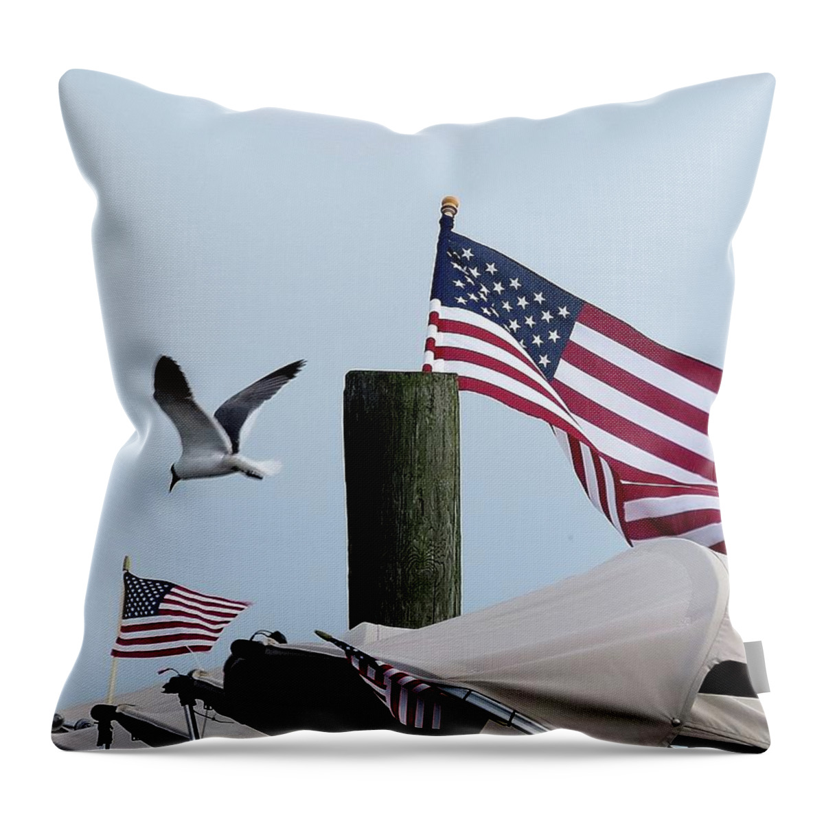 American Flag Throw Pillow featuring the photograph Old Glory and Gull by Linda Stern