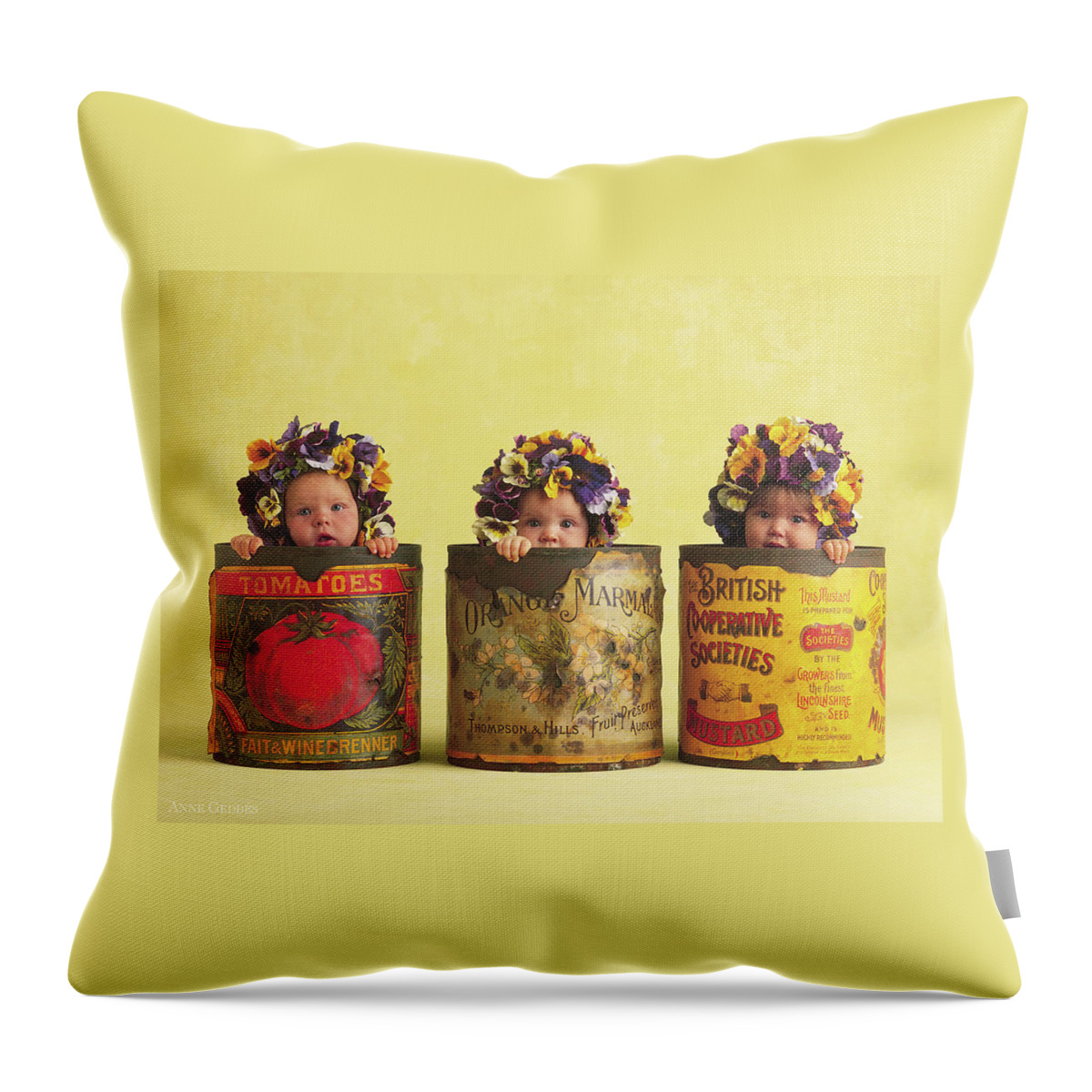 Pansy Throw Pillow featuring the photograph Pansy Tins by Anne Geddes
