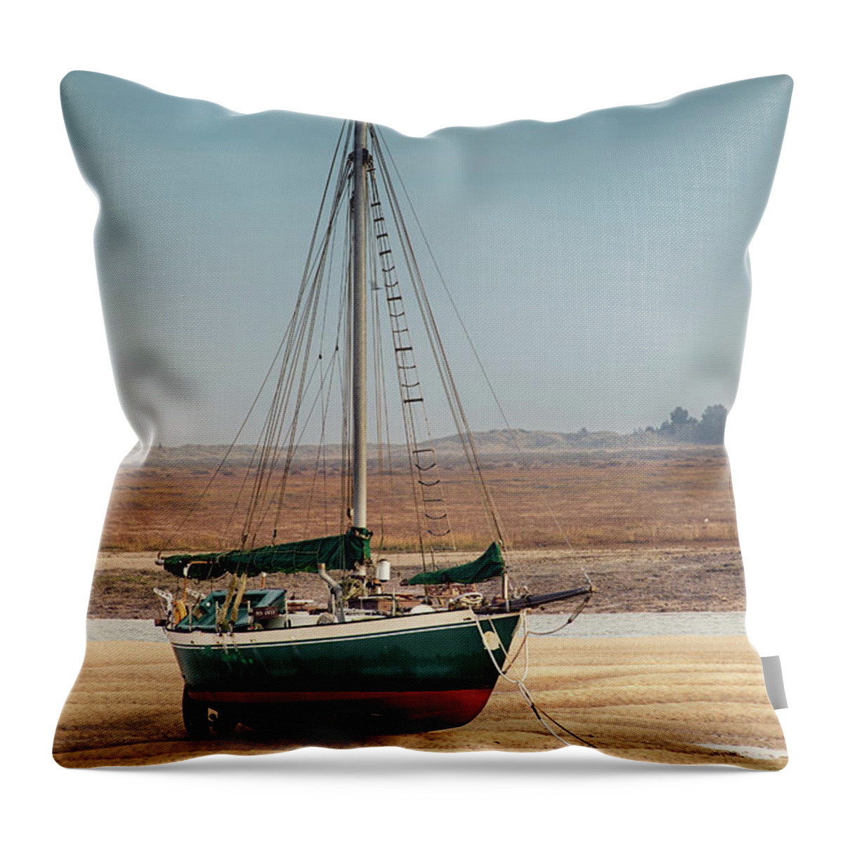 Wells Throw Pillow featuring the photograph Norfolk sail boat stranded at low tide by Simon Bratt