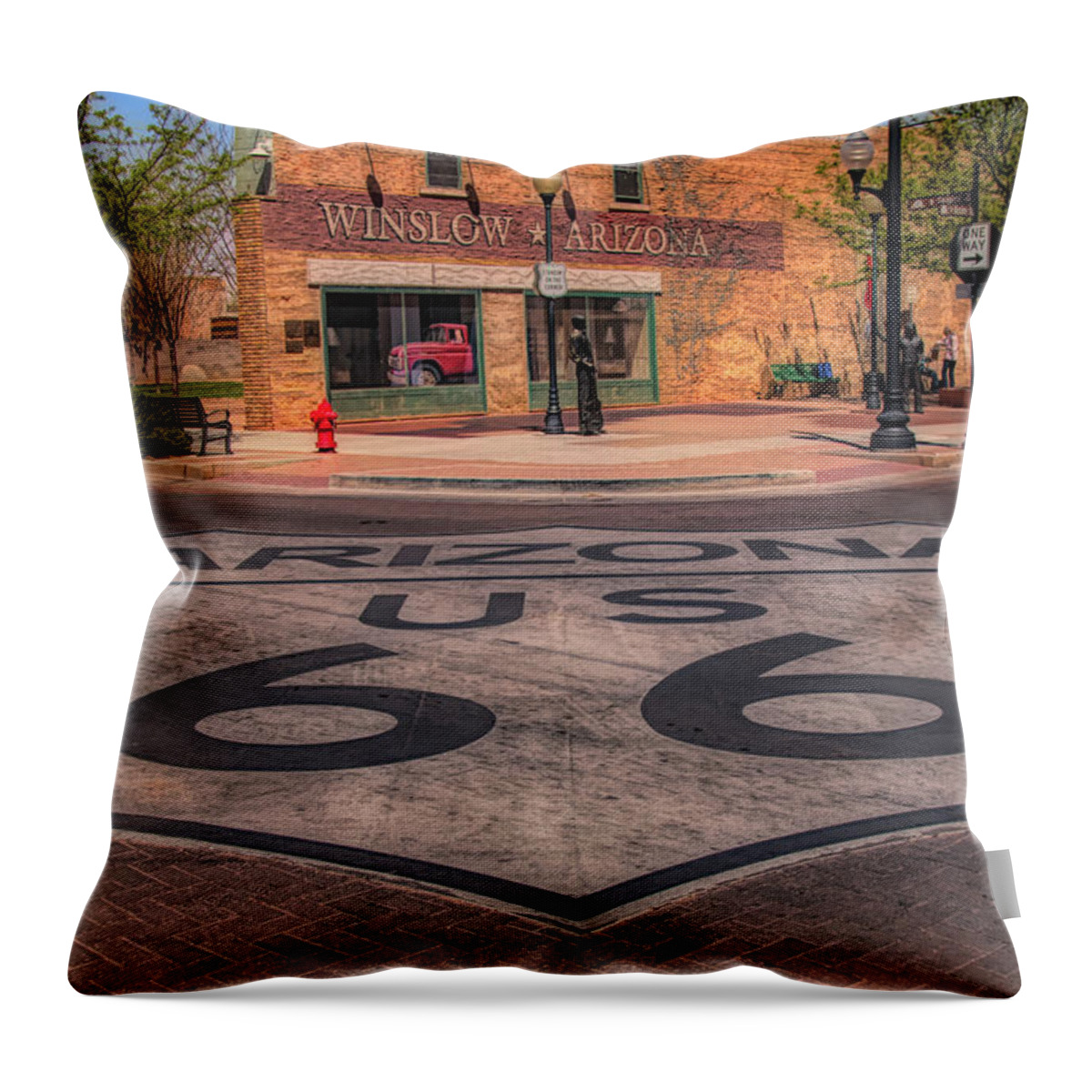 Winslow Arizona Throw Pillow featuring the photograph Standin on the corner by Jeff Folger