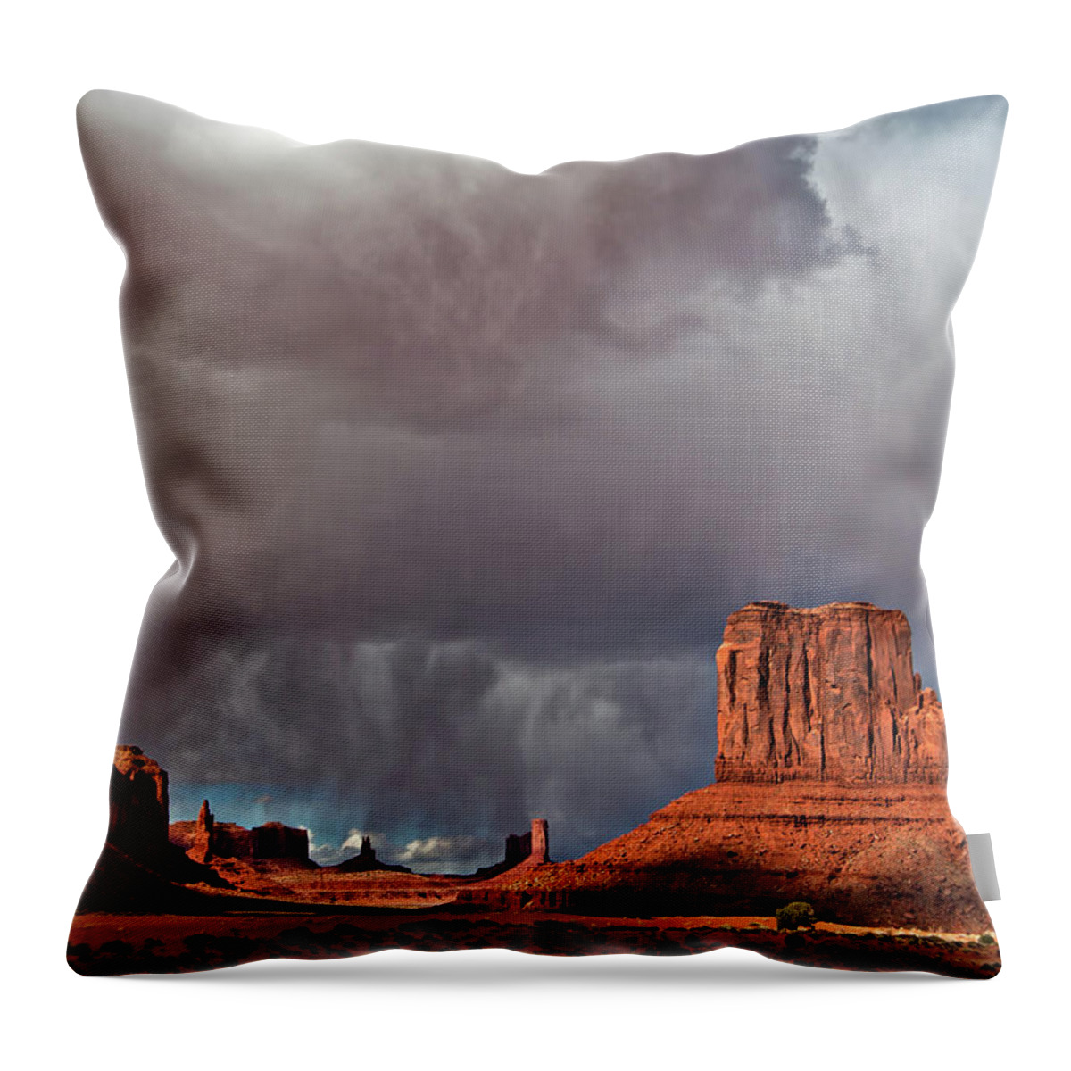 Desert Throw Pillow featuring the photograph Storm over Monument Valley by Wesley Aston