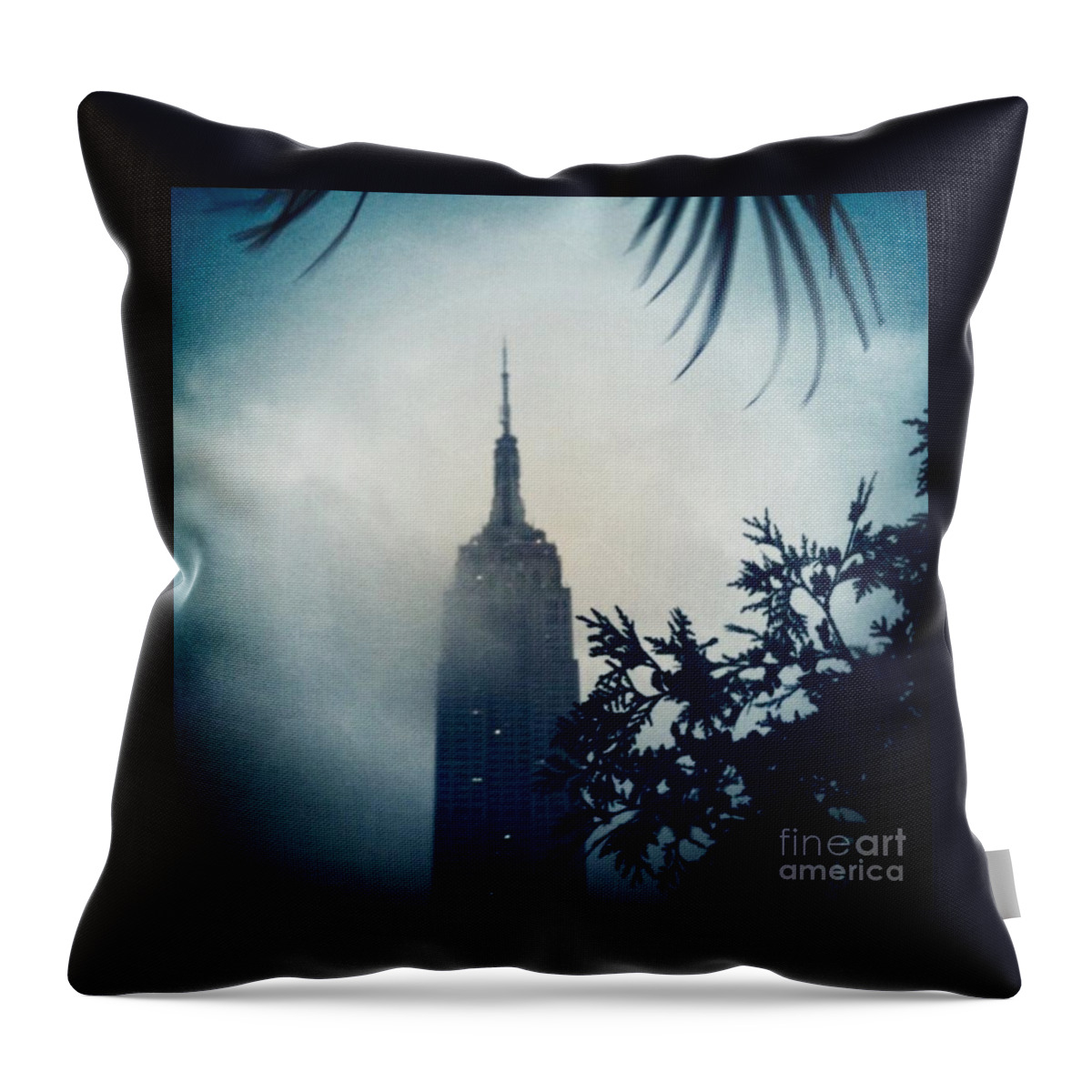 Empire State Building Throw Pillow featuring the photograph Stormy Skies by Denise Railey