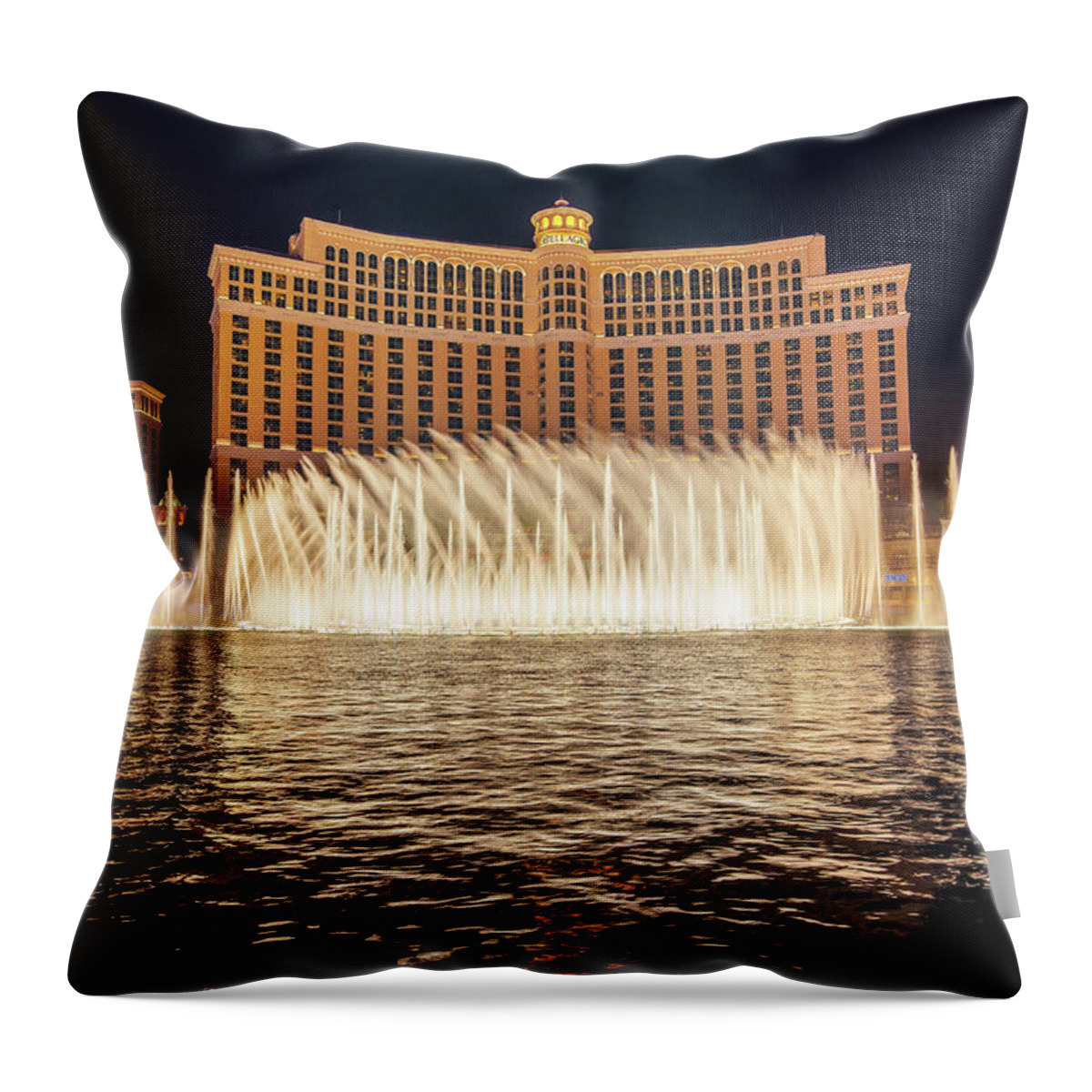 The Fountains of Bellagio at night in Las Vegas Throw Pillow
