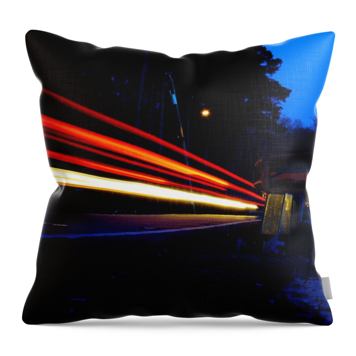 Light Trail Throw Pillow featuring the photograph The Trail To... by Nicole Lloyd