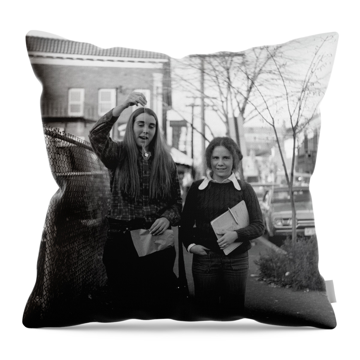 Brown University Throw Pillow featuring the photograph Two Brown Students, Thayer Street, Providence, 1972 by Jeremy Butler
