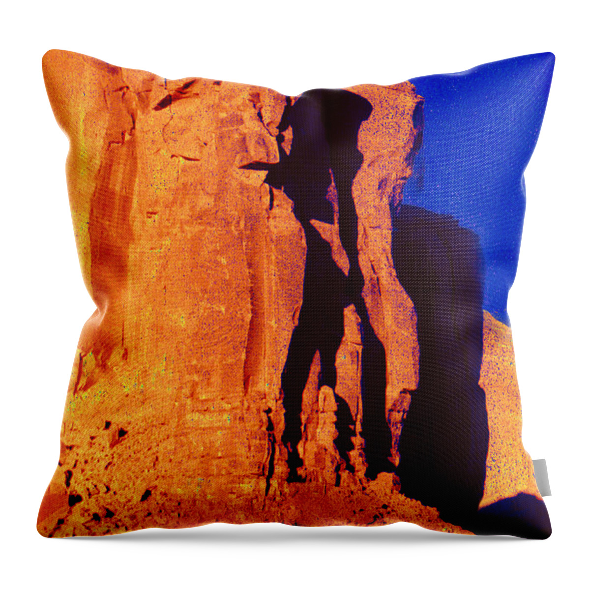 Southwest Landscape Throw Pillow featuring the photograph Warrior in the Rock in Monument Valley by Joe Hoover