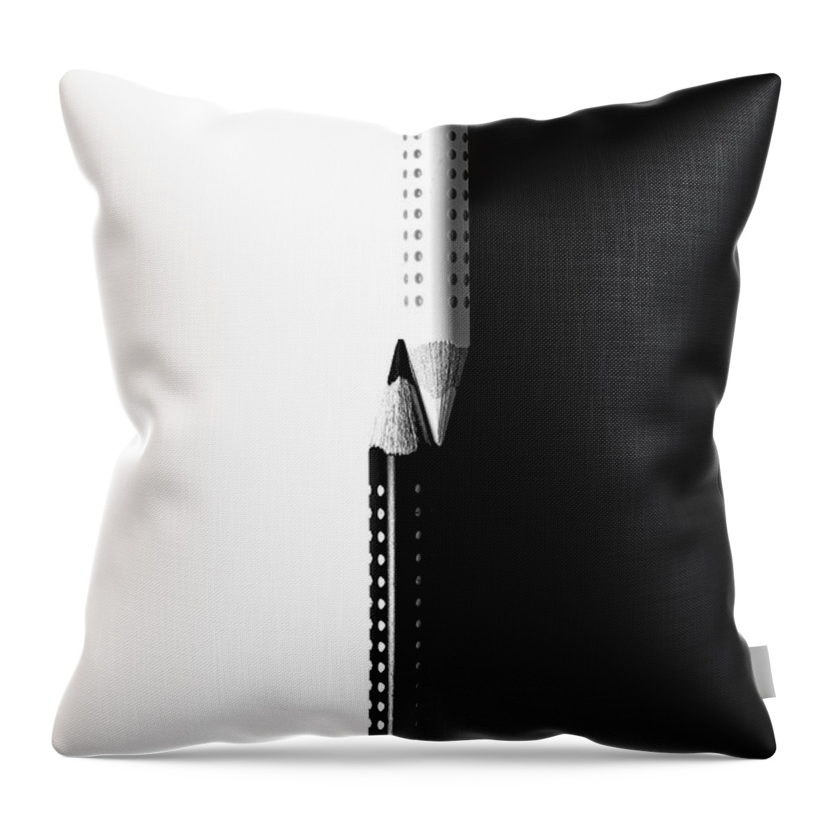 Pencil Throw Pillow featuring the photograph Two drawing pencils on a black and white surface. by Michalakis Ppalis
