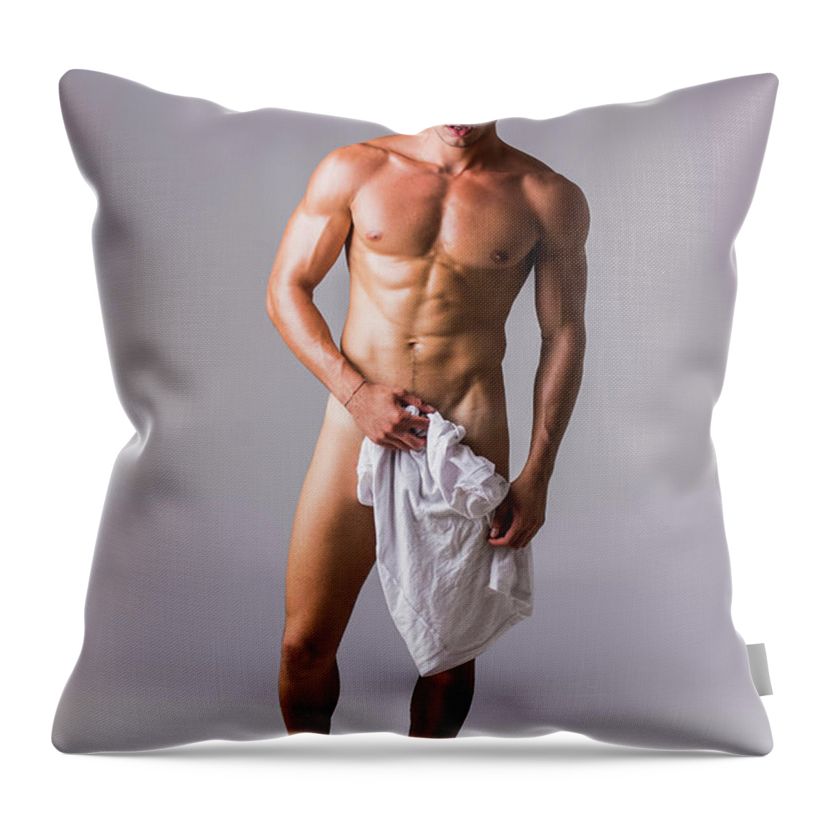 Naked muscular man covering crotch with shirt #6 Throw Pillow