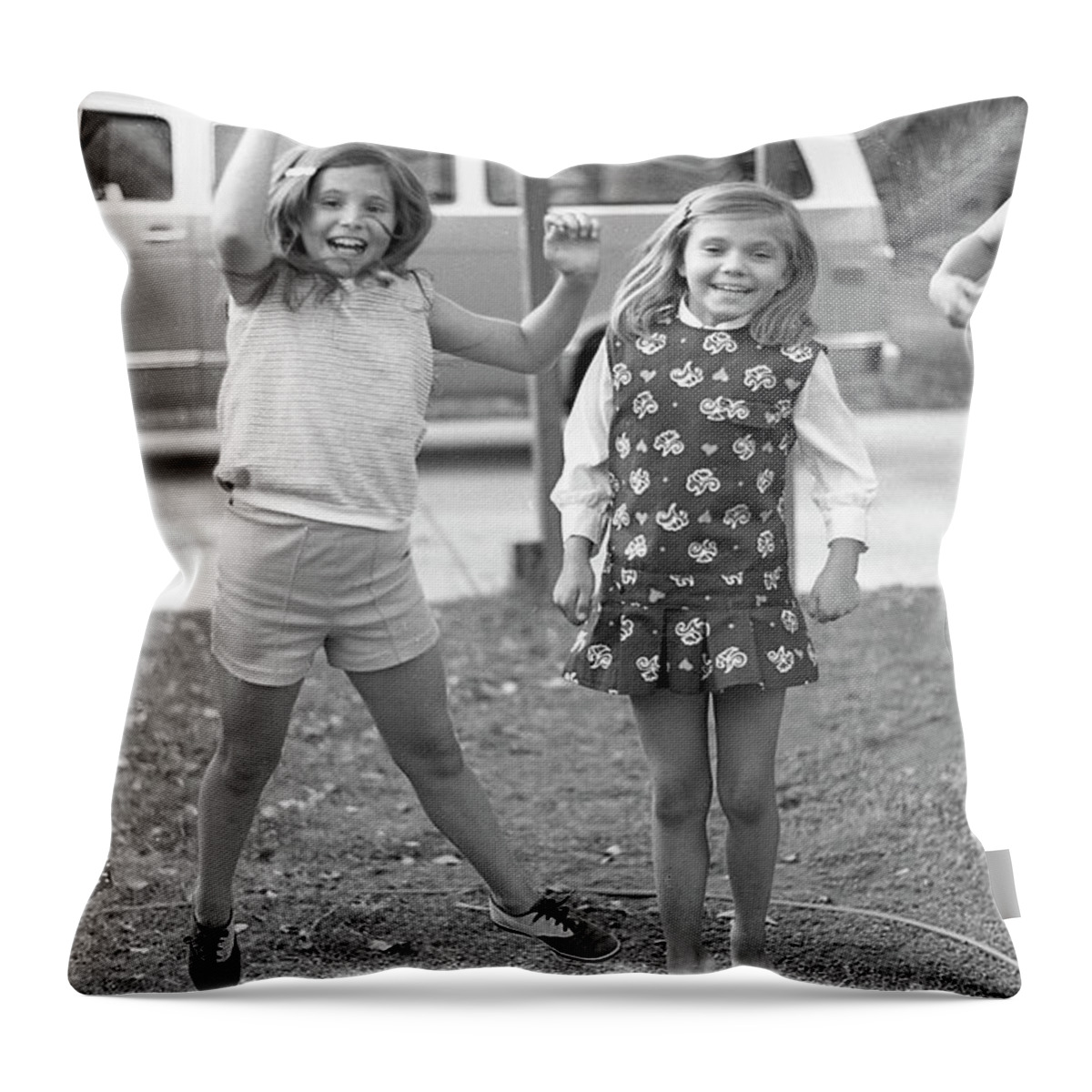 Jumping Throw Pillow featuring the photograph Four Girls, Jumping, 1972 by Jeremy Butler