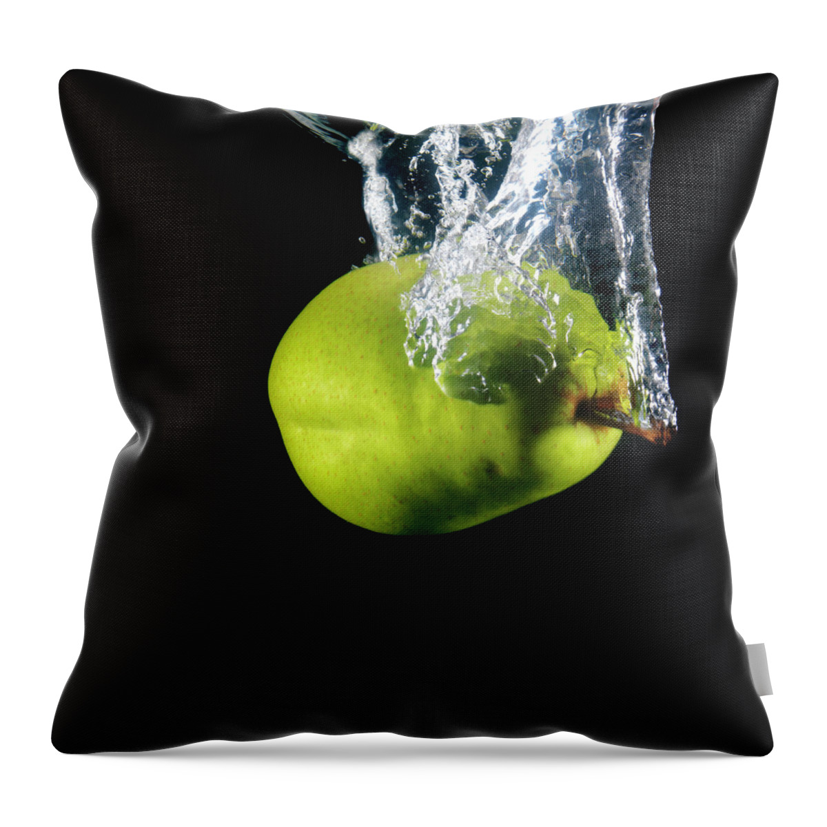 Black Background Throw Pillow featuring the photograph Green Pear Sinking In Water by Henrik Sorensen