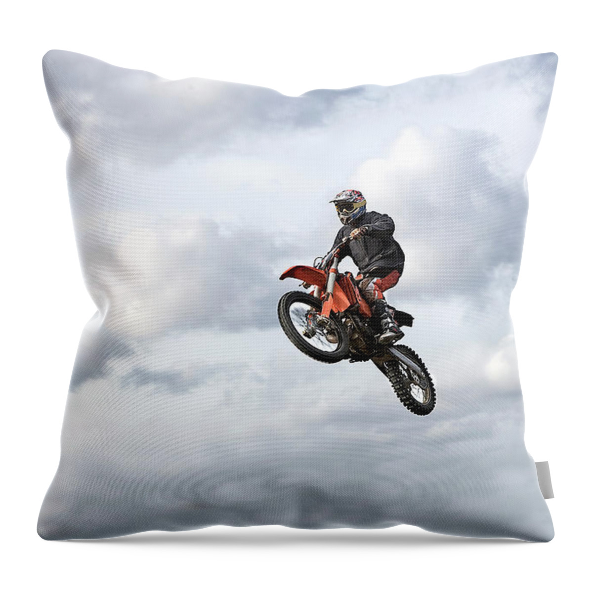 Recreational Pursuit Throw Pillow featuring the photograph Motocross Rider In Mid-air, Low Angle by Claus Christensen