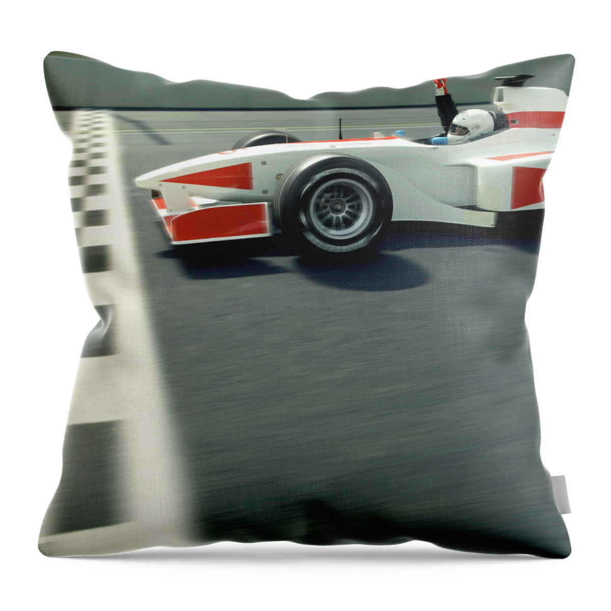 Aerodynamic Throw Pillow featuring the photograph Racing Driver Crossing Finishing Line by Alan Thornton