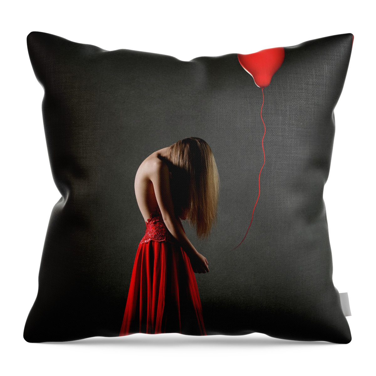 Woman Throw Pillow featuring the photograph Sad woman in red by Johan Swanepoel