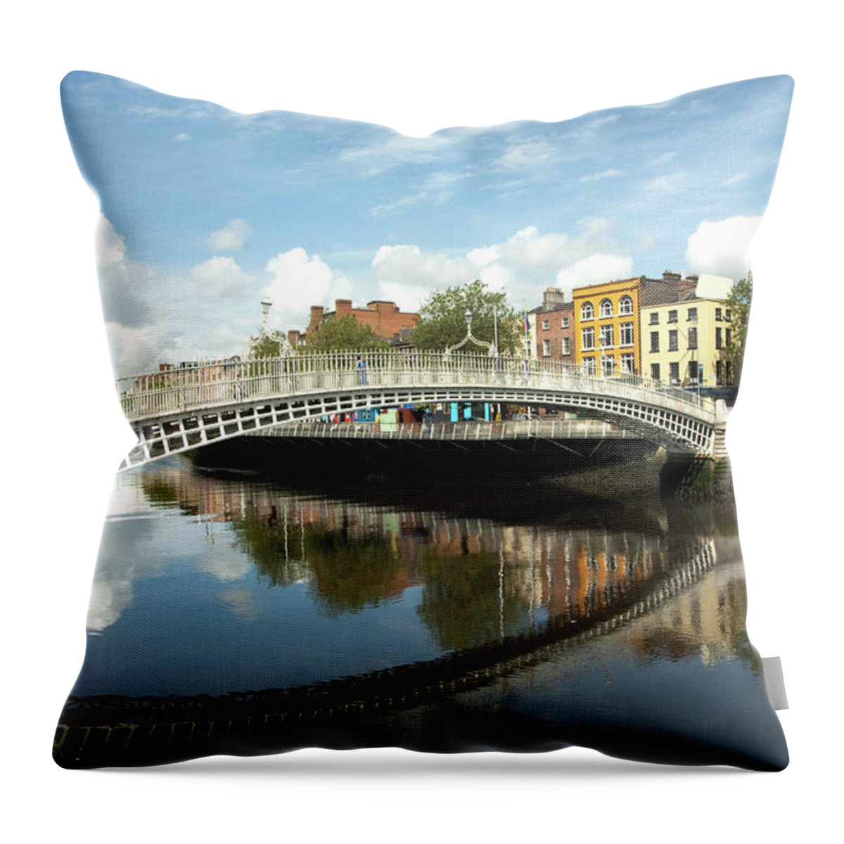 Dublin Throw Pillow featuring the photograph The Famous Hapenny Bridge In Dublin by Stevenallan