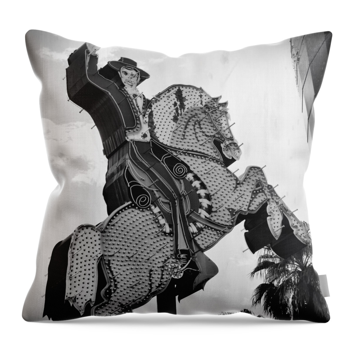 Cowboy Throw Pillow featuring the photograph The Hacienda Horse And Rider Neon Sign BW by Mary Pille