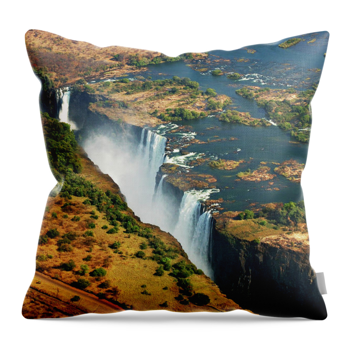 Scenics Throw Pillow featuring the photograph Victoria Falls, Zambia by © Pascal Boegli