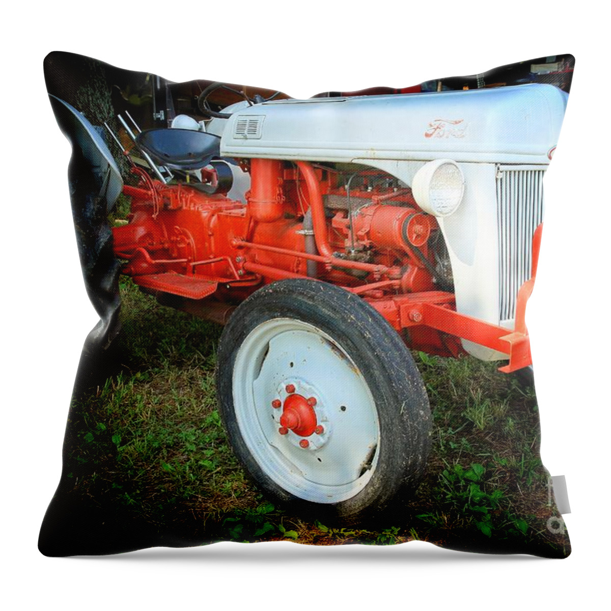 Ford Tractor Throw Pillow featuring the photograph Ford Tractor by Mike Eingle