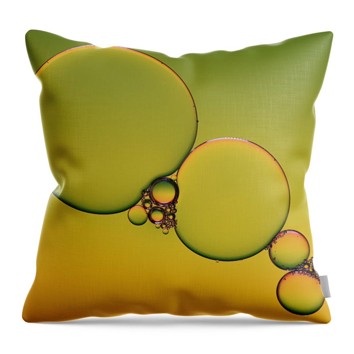 Connection Throw Pillow featuring the photograph Bright abstract, yellow background with flying bubbles by Michalakis Ppalis