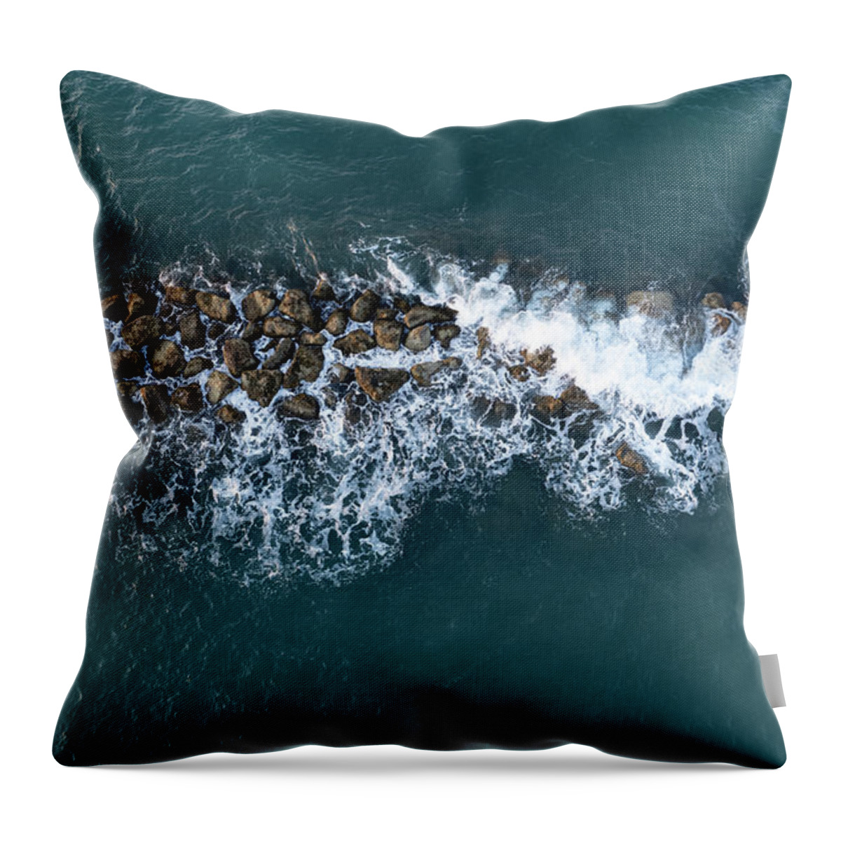 Ocean Throw Pillow featuring the photograph Aerial view from a flying drone of blue sea water and break water. Sea wall coastline by Michalakis Ppalis