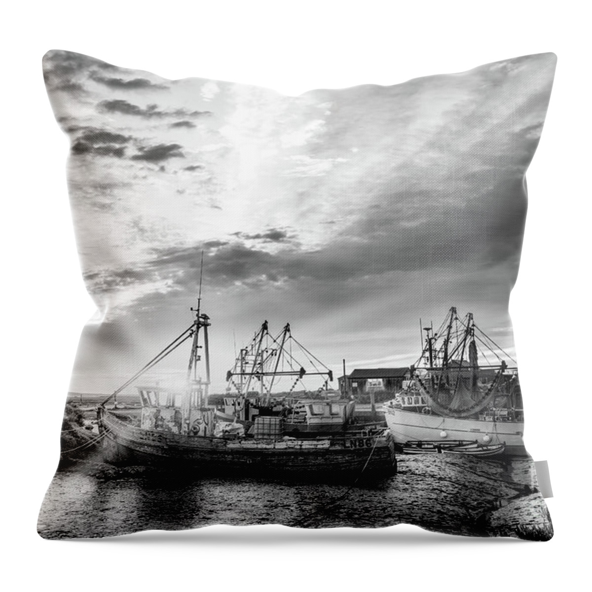 Norfolk Throw Pillow featuring the photograph Brancaster Norfolk fishing trawlers at sunrise BW by Simon Bratt
