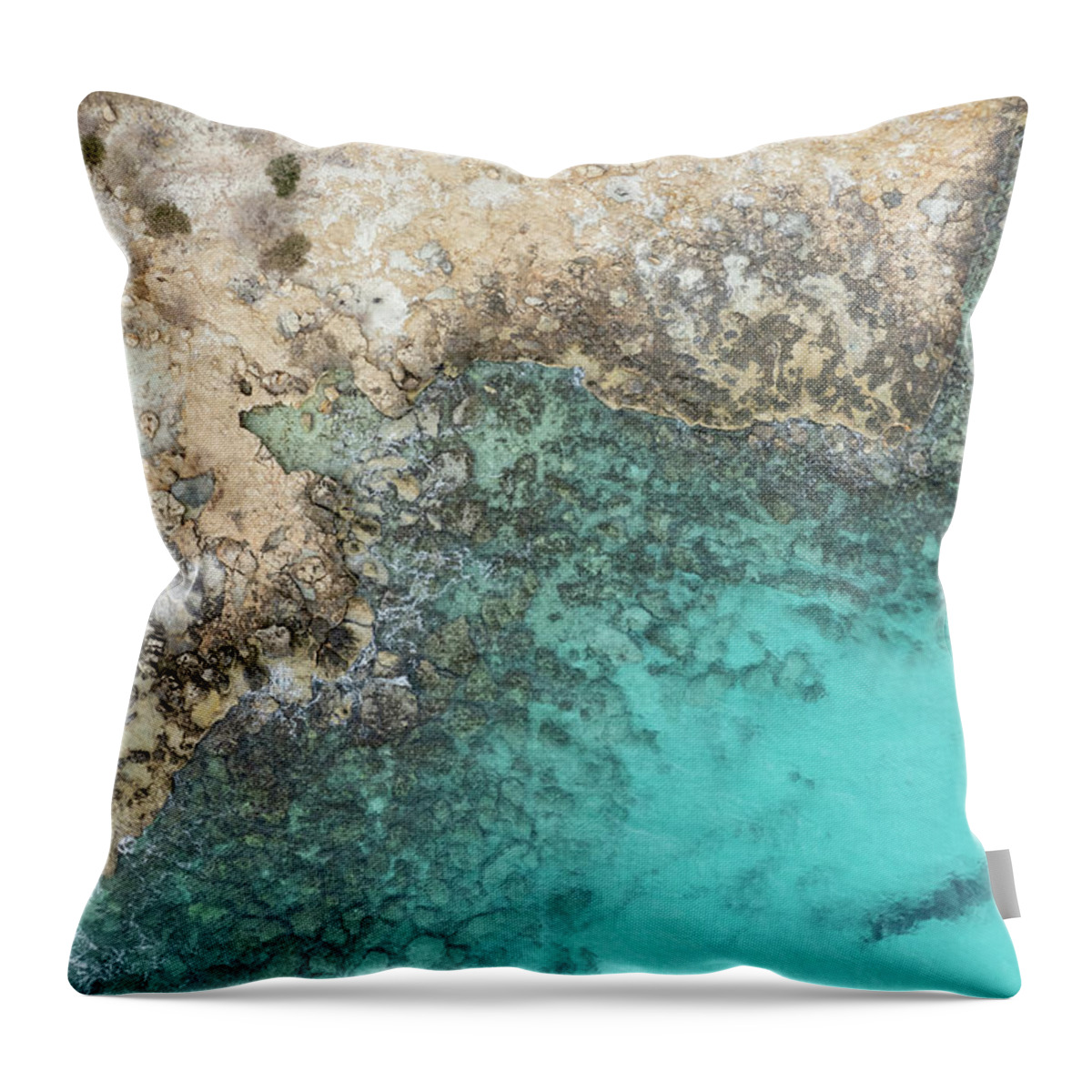 Rocky Beach Throw Pillow featuring the photograph Drone aerial of rocky sea coast with transparent turquoise water. Seascape top view by Michalakis Ppalis