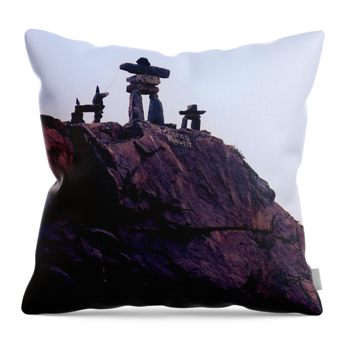 Inukshuk Throw Pillow featuring the photograph Inukshuk family in Labrador, Canada by Tatiana Travelways