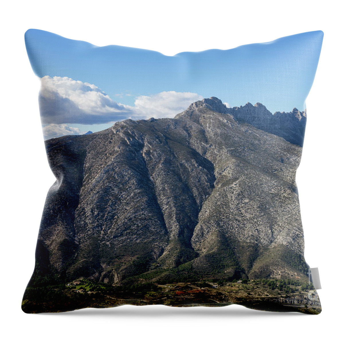 Mountain Landscape Throw Pillow featuring the photograph Sierra de Bernia mountain ridge and clouds by Adriana Mueller