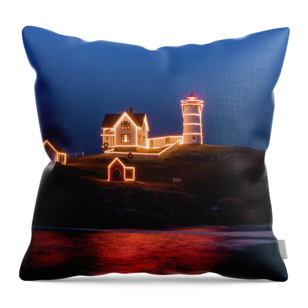 Maine Lighthouse Throw Pillow featuring the photograph Nubble lighthouse with Christmas Lights by Jeff Folger
