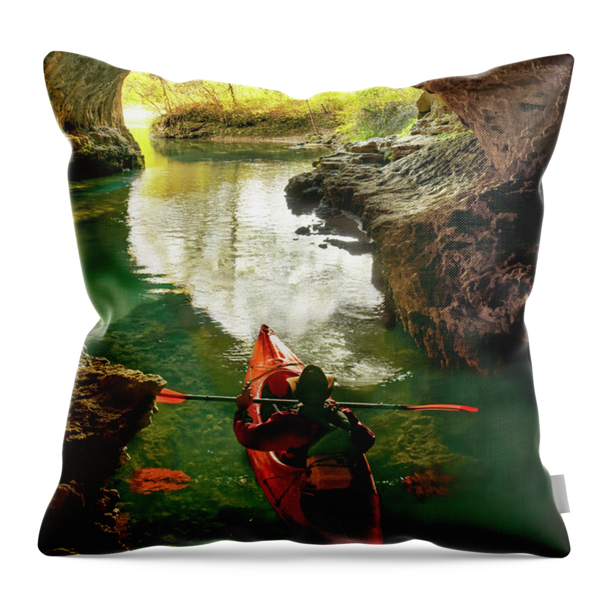 Kayak Throw Pillow featuring the photograph paddling in Cave Spring by Robert Charity