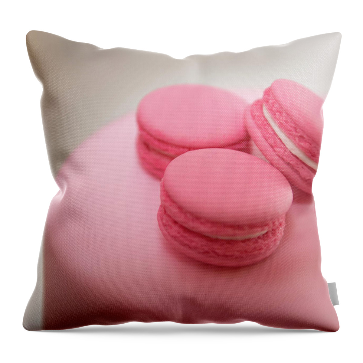 Macaroon Throw Pillow featuring the photograph Pink color french delicious macaroons cookies. Shallow dof by Michalakis Ppalis