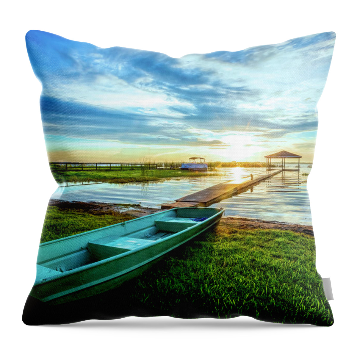 Docks Throw Pillow featuring the photograph Rowboat at the Water's Edge by Debra and Dave Vanderlaan