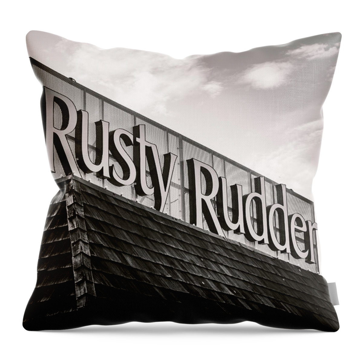 Rusty Throw Pillow featuring the photograph Rusty Rudder Sign by Jason Fink
